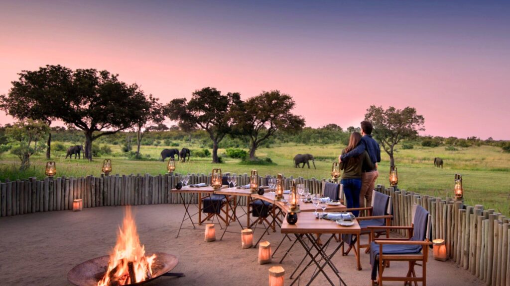 Vast landscape of rolling green hills and pristine valleys showcasing the rich diversity of Uganda on a grand luxury expedition